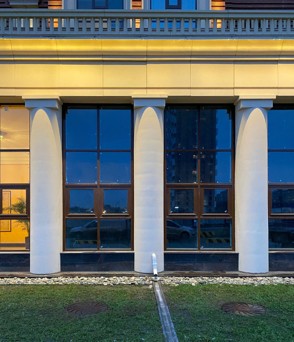The colonnade of the plinth. A fragment. The evening light. Renaissance housing complex Copyright: Photograph  Stepan Liphart /provided by Liphart Architects