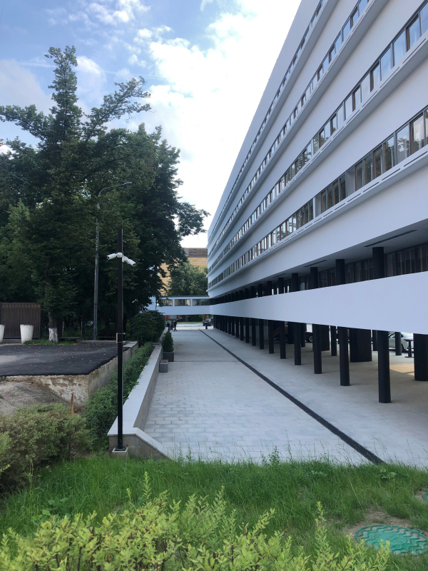 View of the east facade of the residential building from the side of the USA Embassy after the restoration. Restoration and adaptaion of the the cultural heritage site “Narkomfin Building” (2017-2020) Copyright: Photograph provided by Ginzburg Architects