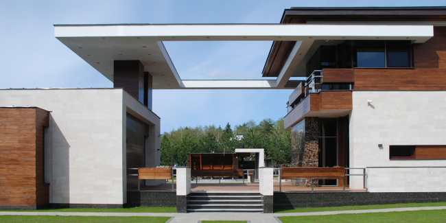 Country house in Moscow area. The complex metallic rig above the terrace between the main and the guest houses  Fourth dimension