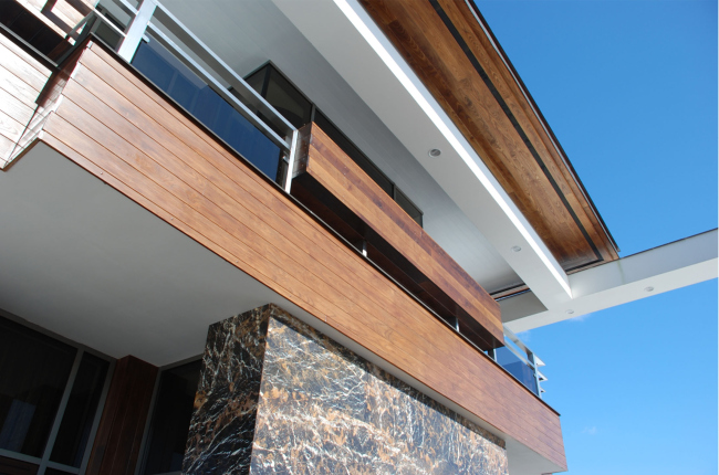 Country house in Moscow area. Fragment of dark natural stone � Fourth dimension