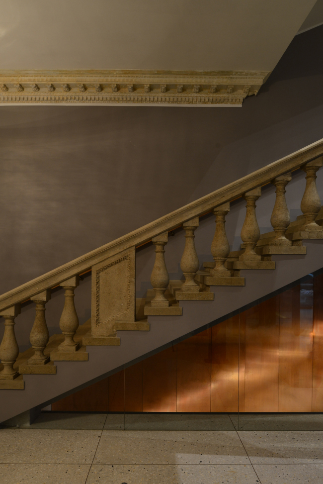 Stairway leading from the first floor (level of the street and he foyer) to the second floor (stage level). "Electrotheater Stanislavsky". Photo  Ilia Ivanov, 2014