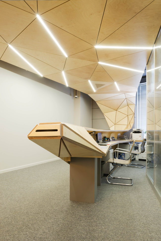 The interior design of the reception area of MGPM. Backlight � Totan Kuzembaev Architectural Studio