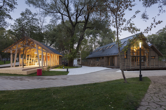 The house for master classes (left) and the cowshed(right). Urban farm at VDNKh, 1st phase. WOWhaus Bureau. Photograph  Dmitry Chebanenko