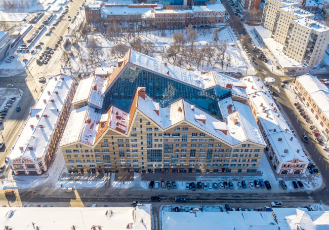 The elite ASTRA housing complex and the reconstruction of shopping arcades of the XIX century  Synchrotecture