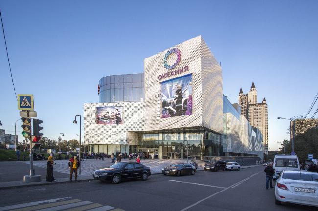 The main facade and the square before the metro station exit. "Oceania" multifunctional center (facade solution)  Asadov Architectural Bureau