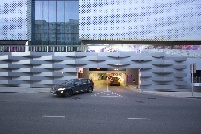 Entrance to the parking garage beneath the pedestrian gallery. "Oceania" multifunctional center (facade solution) � Asadov Architectural Bureau
