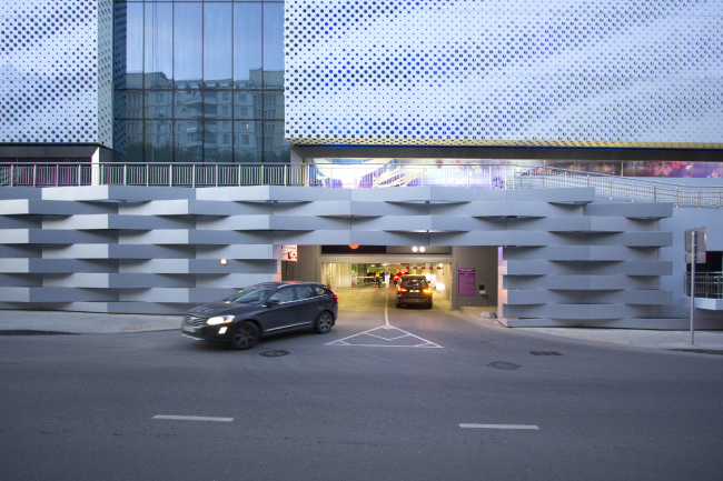 Entrance to the parking garage beneath the pedestrian gallery. "Oceania" multifunctional center (facade solution)  Asadov Architectural Bureau