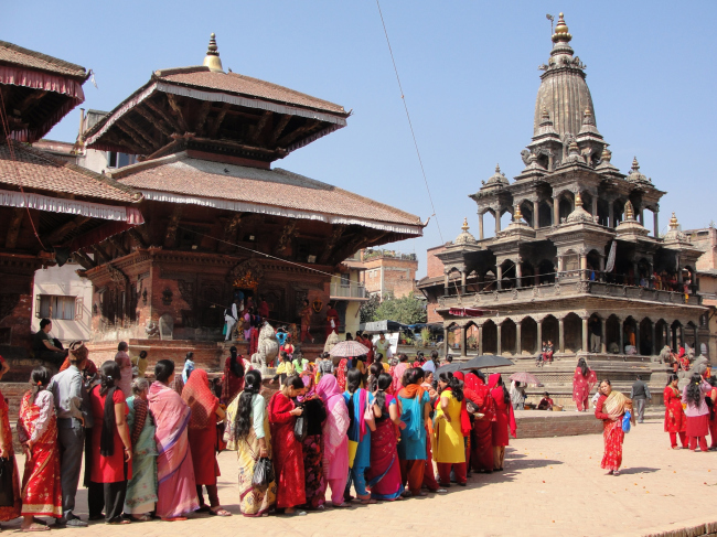 People lining up to pray at the Char Narayan Temple in Patan Durbar Square.  Kai Weise 