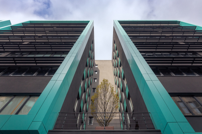 "Optima-Plaza" office complex. Trees on the terraces between the projections  Archimatika