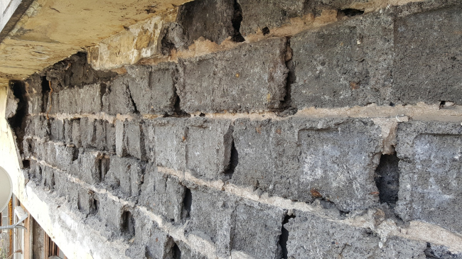 The Narkomfin Building. "Peasant" stones. Photo courtesy by Ginsburg Architects