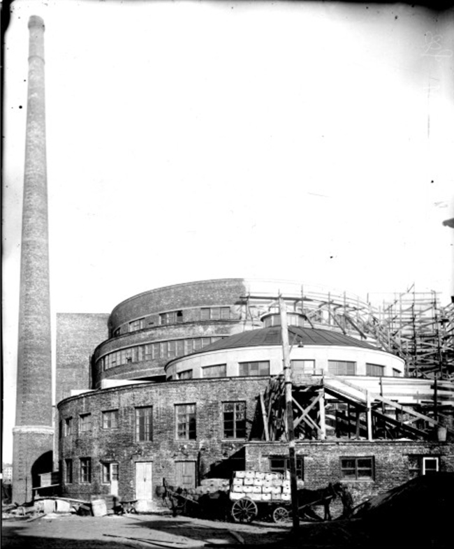 View of the building from the west side of the land site, the end of construction, 1933  The Central State Archive of Photographic and Filming Documents of Saint Petersburg