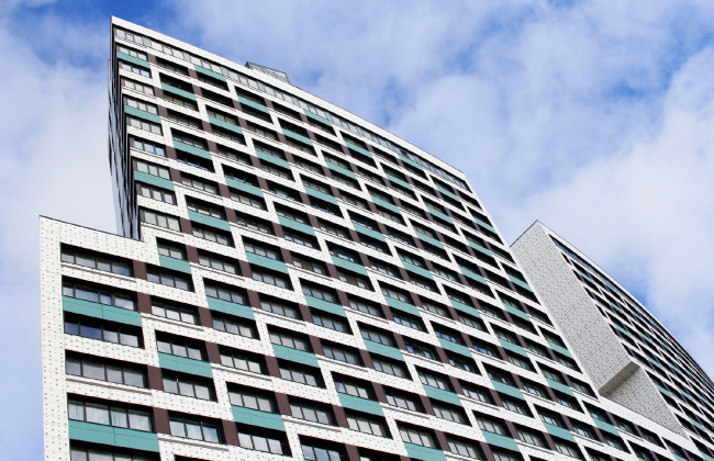 Litsa housing complex. The street facade, a fragment