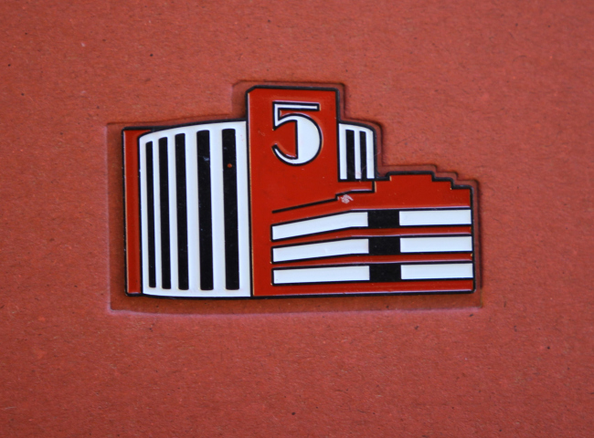 A fragment of the badge on the cover. The book "Automated Bread Factory #5. The Masterpieces of avant-garde", Moscow, VTB Cultural Center, 2022