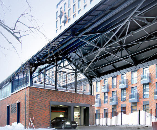 The entrance to the parking garage and the marquee. Composers′ Residences housing complex