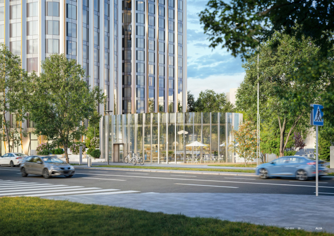 The restaurant behind the glass barrier at the foot of the big towers. Phase 4 of ALIA residential area. 