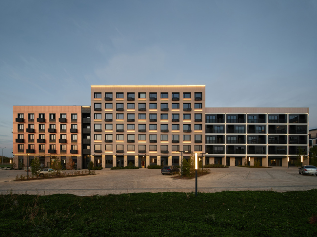 The residential complex of the “U” Block. Phase 1. View from the inner street